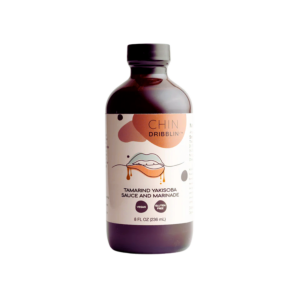 Chindribblin Tamarind Yakisoba Sauce and Marinade in a bottle, showcasing a rich, tangy blend of tamarind and savory spices, perfect for stir-fries or marinating meats